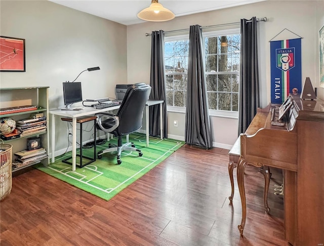 office area with wood finished floors and baseboards