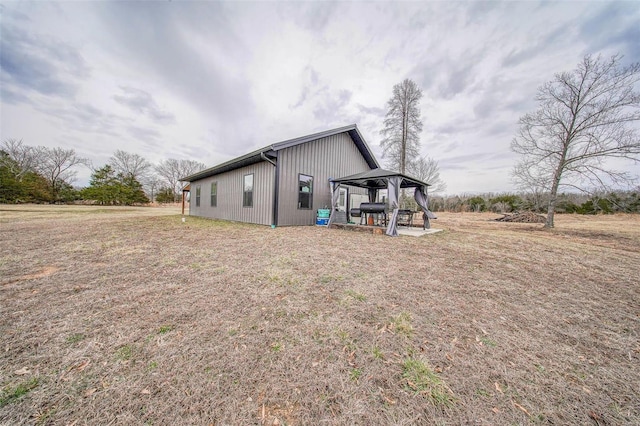 view of property exterior with a yard