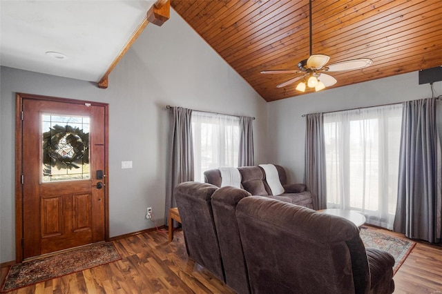 living area with a ceiling fan, high vaulted ceiling, baseboards, and wood finished floors