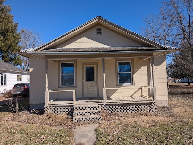 bungalow-style home with a porch