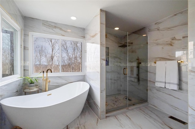 bathroom with marble finish floor, a marble finish shower, recessed lighting, a soaking tub, and visible vents