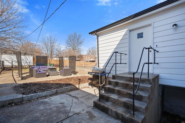 view of patio / terrace with an outdoor hangout area, grilling area, and fence