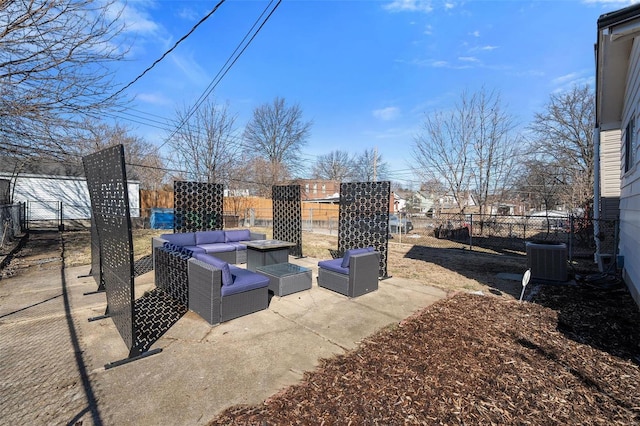 view of patio / terrace featuring a fenced backyard, central AC unit, and an outdoor hangout area