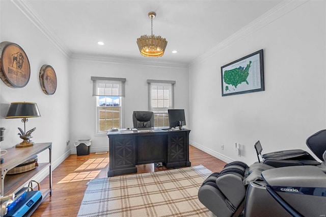 home office with ornamental molding, baseboards, and wood finished floors