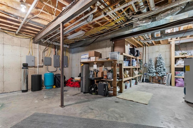 unfinished basement with water heater