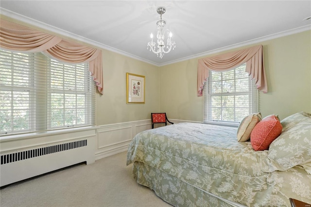 bedroom featuring carpet floors, radiator, ornamental molding, and a decorative wall