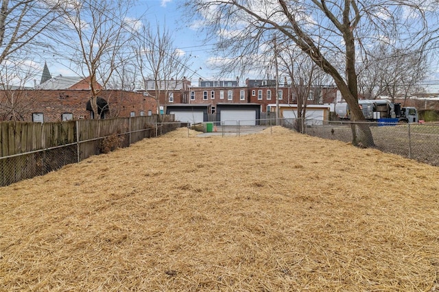 view of yard with fence