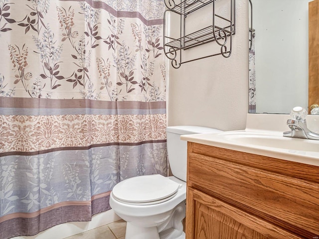 full bathroom featuring vanity, tile patterned flooring, toilet, and a shower with curtain