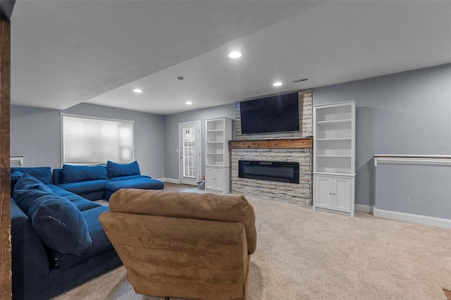 carpeted living room with a fireplace, built in features, recessed lighting, and baseboards