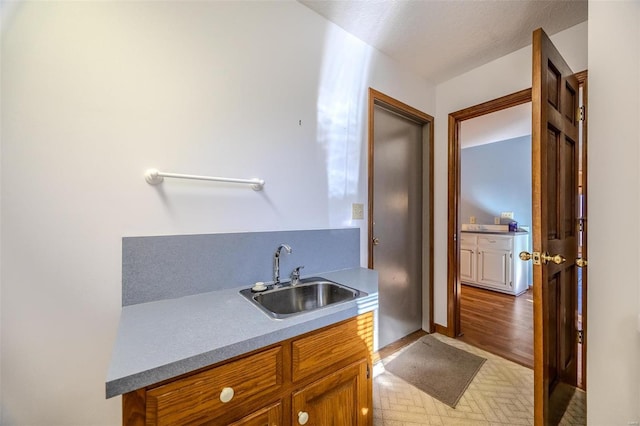 bathroom featuring a sink and tile patterned floors