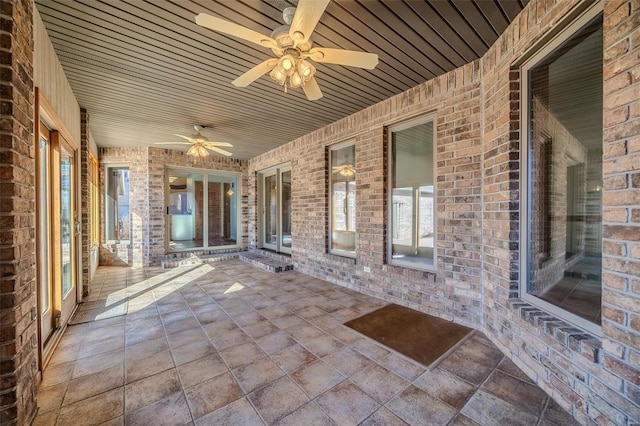 view of patio with ceiling fan