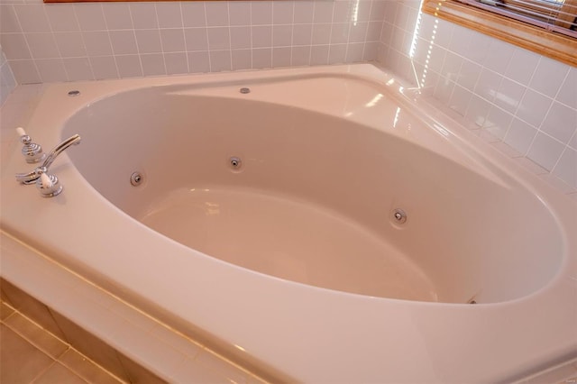 interior details with a whirlpool tub