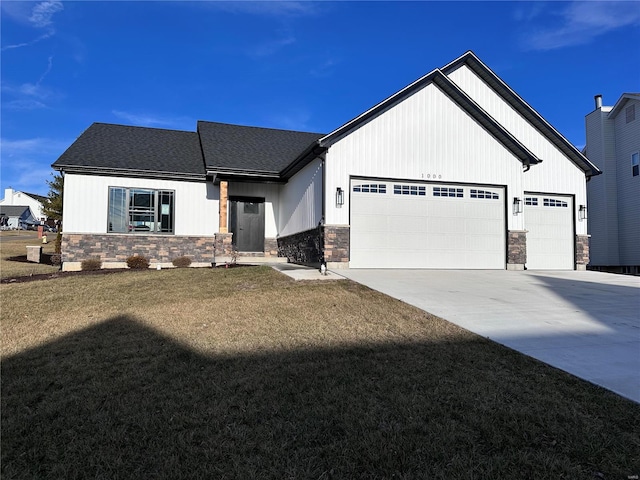 view of front of house with a garage, concrete driveway, stone siding, roof with shingles, and a front lawn