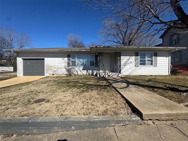 ranch-style house with a front lawn and an attached garage