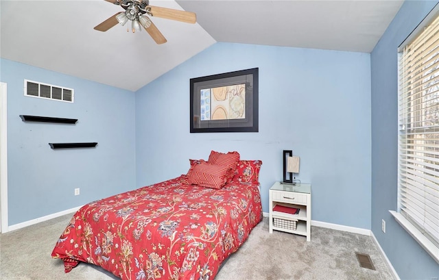 bedroom featuring multiple windows, carpet, and visible vents