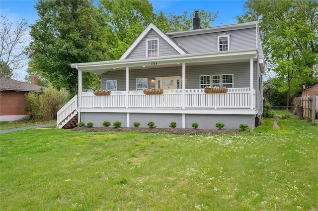 view of front of home featuring a front yard, covered porch, fence, and a chimney