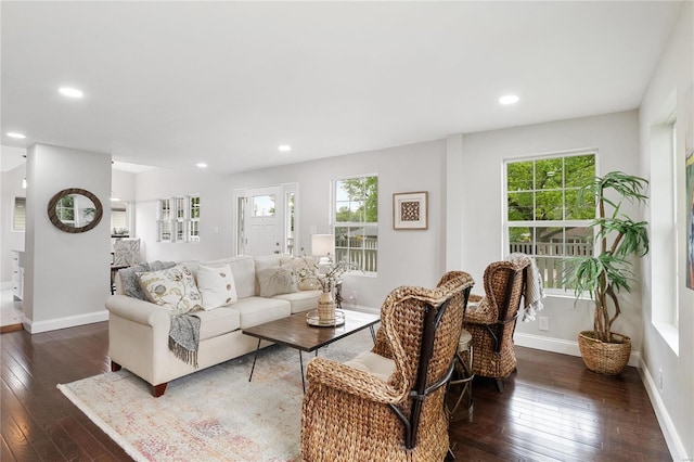 living room with baseboards, dark wood-style flooring, and recessed lighting