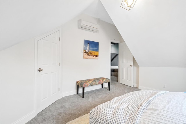 bedroom featuring lofted ceiling, a wall unit AC, light carpet, and baseboards