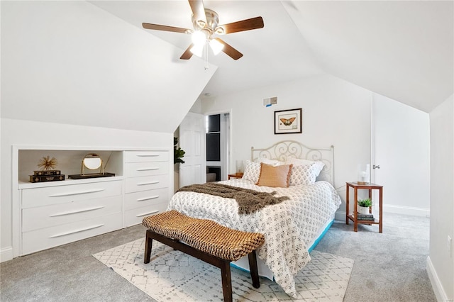 bedroom featuring light carpet, ceiling fan, baseboards, and vaulted ceiling