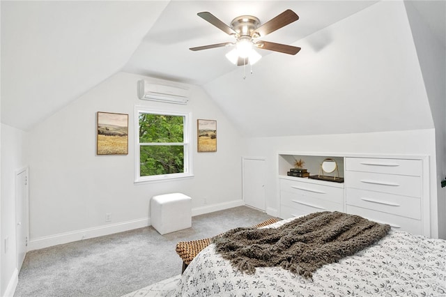 bedroom featuring light carpet, vaulted ceiling, a wall unit AC, and baseboards