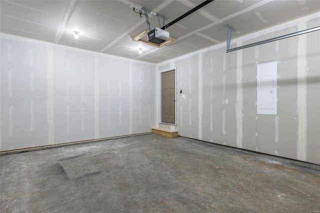 garage featuring electric panel and a garage door opener