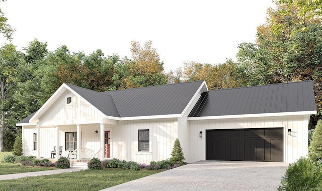 modern inspired farmhouse featuring metal roof, driveway, a porch, and an attached garage