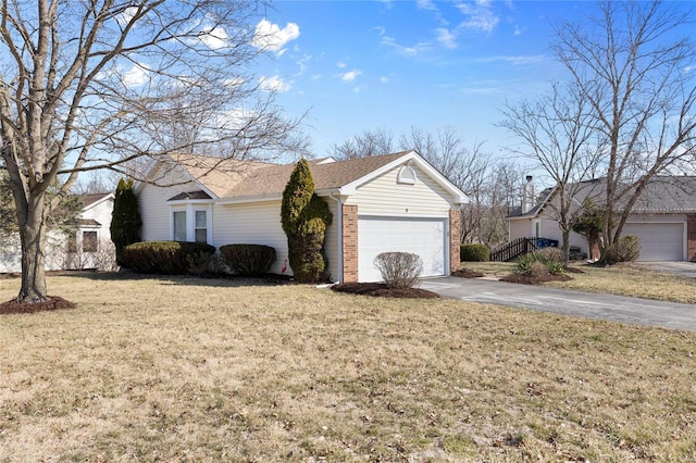 view of front of home featuring concrete driveway, brick siding, an attached garage, and a front lawn