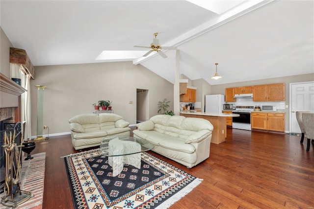 living area with a fireplace, dark wood-type flooring, lofted ceiling with skylight, ceiling fan, and baseboards