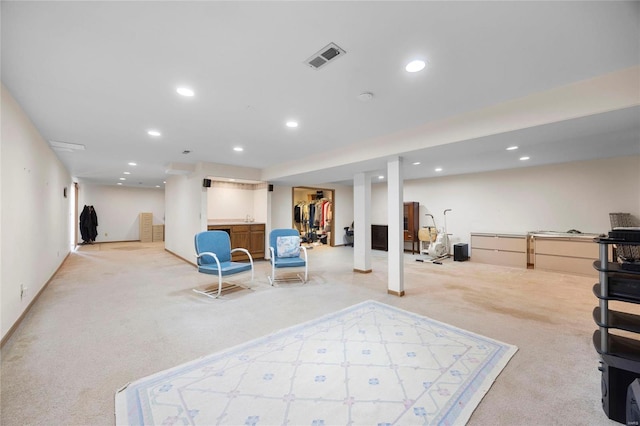 interior space featuring carpet, visible vents, and recessed lighting