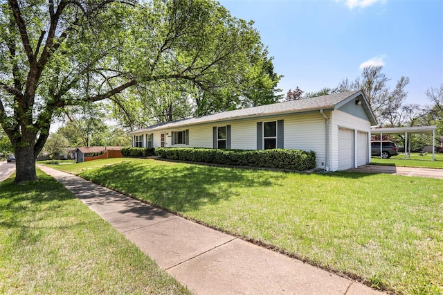 ranch-style house with an attached garage, a front yard, and concrete driveway