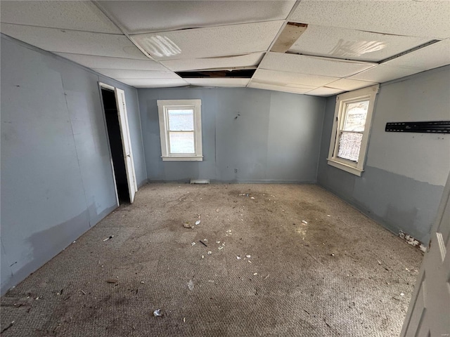 spare room featuring a drop ceiling