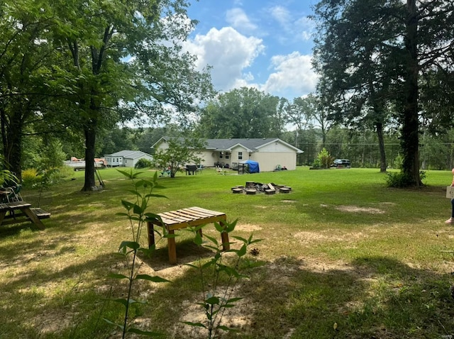 view of community featuring a yard