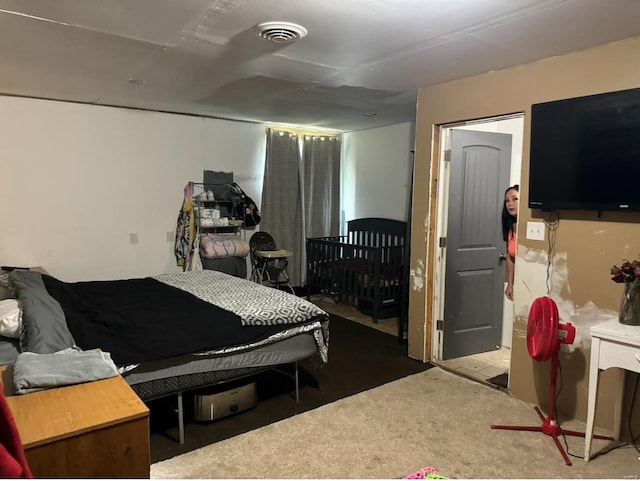 bedroom with visible vents