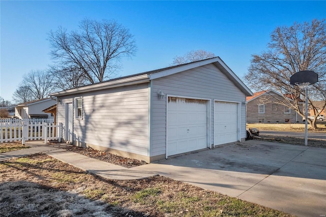 detached garage with fence