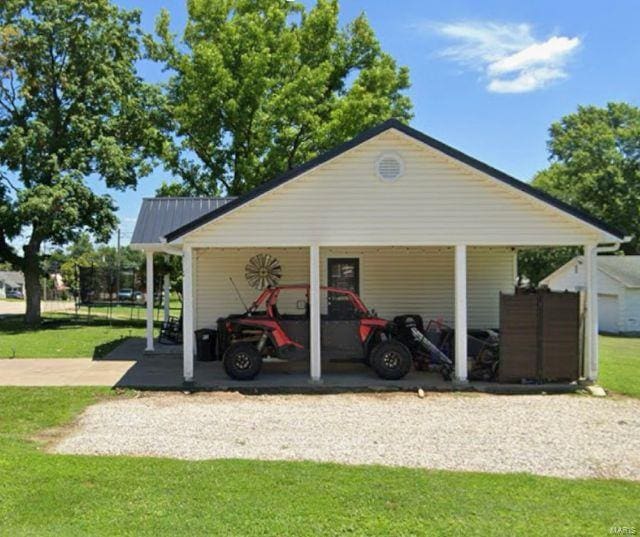 view of outdoor structure featuring a carport