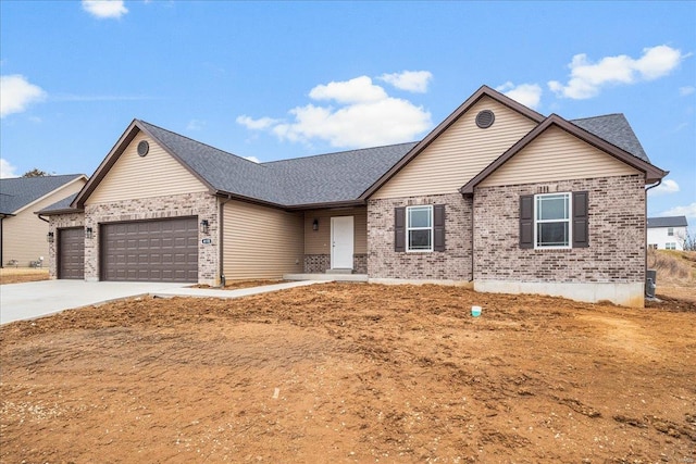 ranch-style home with driveway, roof with shingles, a garage, and brick siding