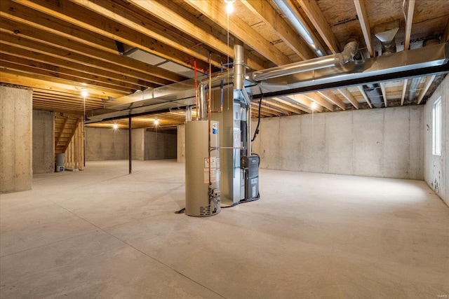 unfinished basement with heating unit and water heater