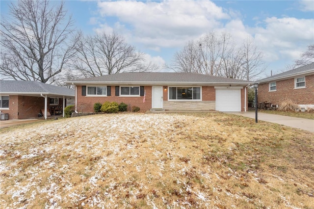 single story home featuring concrete driveway, brick siding, and an attached garage