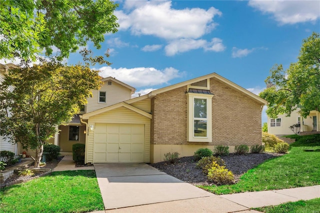 mid-century inspired home featuring driveway, a front yard, and brick siding