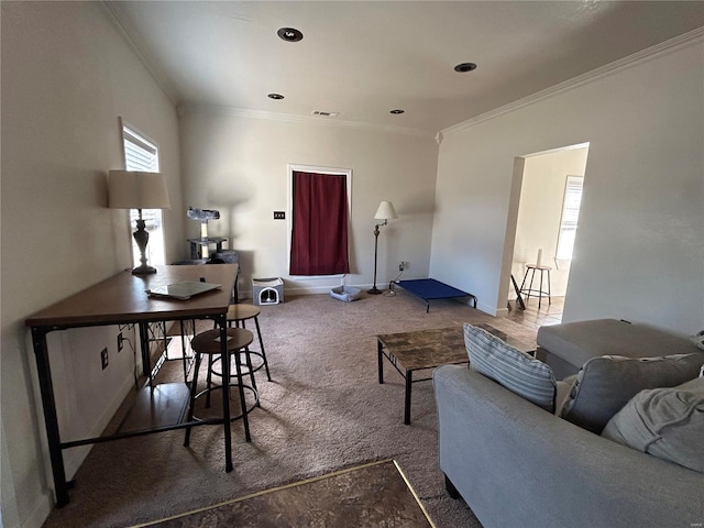 living area featuring ornamental molding, carpet, visible vents, and baseboards