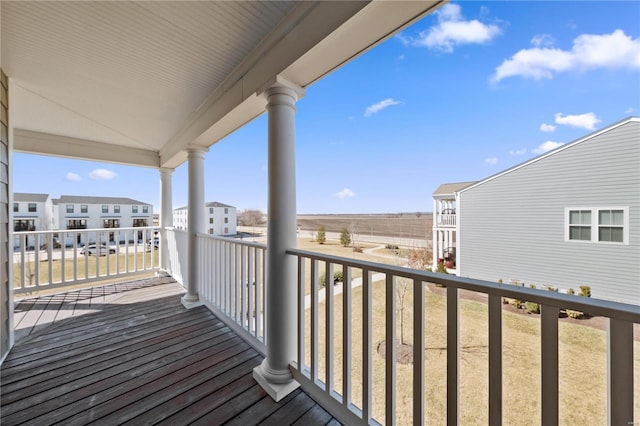 wooden deck featuring a residential view