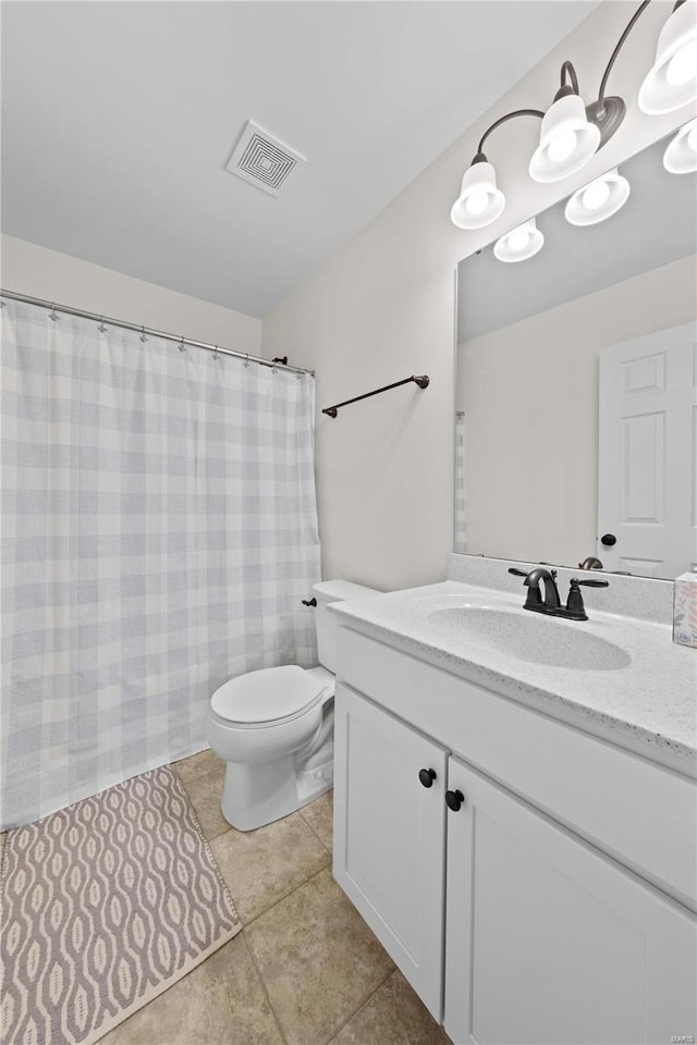 bathroom featuring visible vents, toilet, curtained shower, tile patterned flooring, and vanity