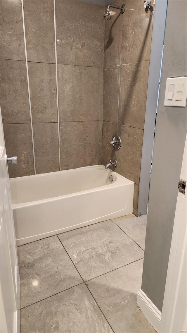 full bathroom featuring shower / bathing tub combination and tile patterned flooring