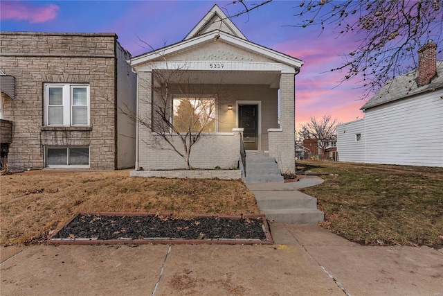 view of front of home featuring covered porch