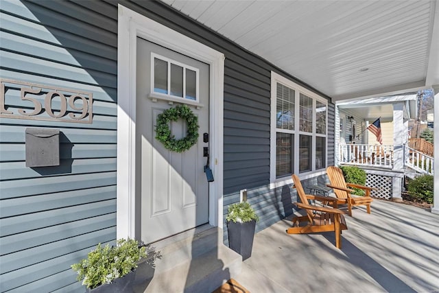 entrance to property with a porch