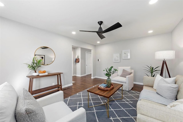 living room with recessed lighting, ceiling fan, baseboards, and wood finished floors