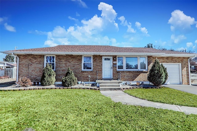 ranch-style house with an attached garage, brick siding, concrete driveway, and a front yard