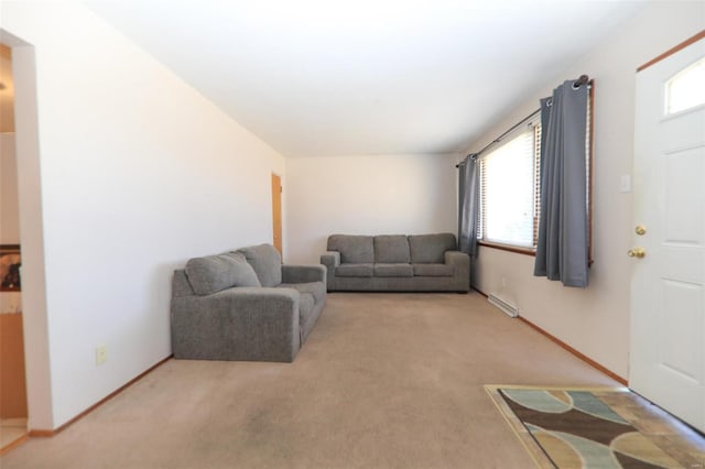 living room with light carpet and baseboards