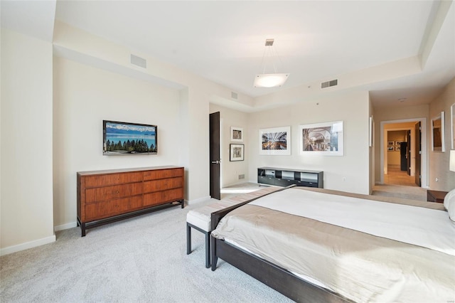 bedroom featuring light colored carpet, visible vents, and baseboards