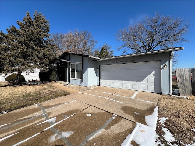 view of front of house with a garage and driveway